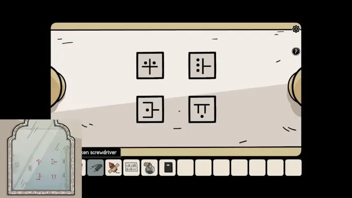 Four symbols arranged in a two-by-two grid on the Mansion drawer lock, with the complete reflected clue.